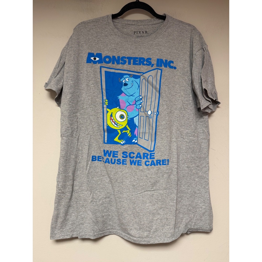 Pixar Monsters Inc T-Shirt Mens Large Grey Excellent We Scare Because‎ We Care